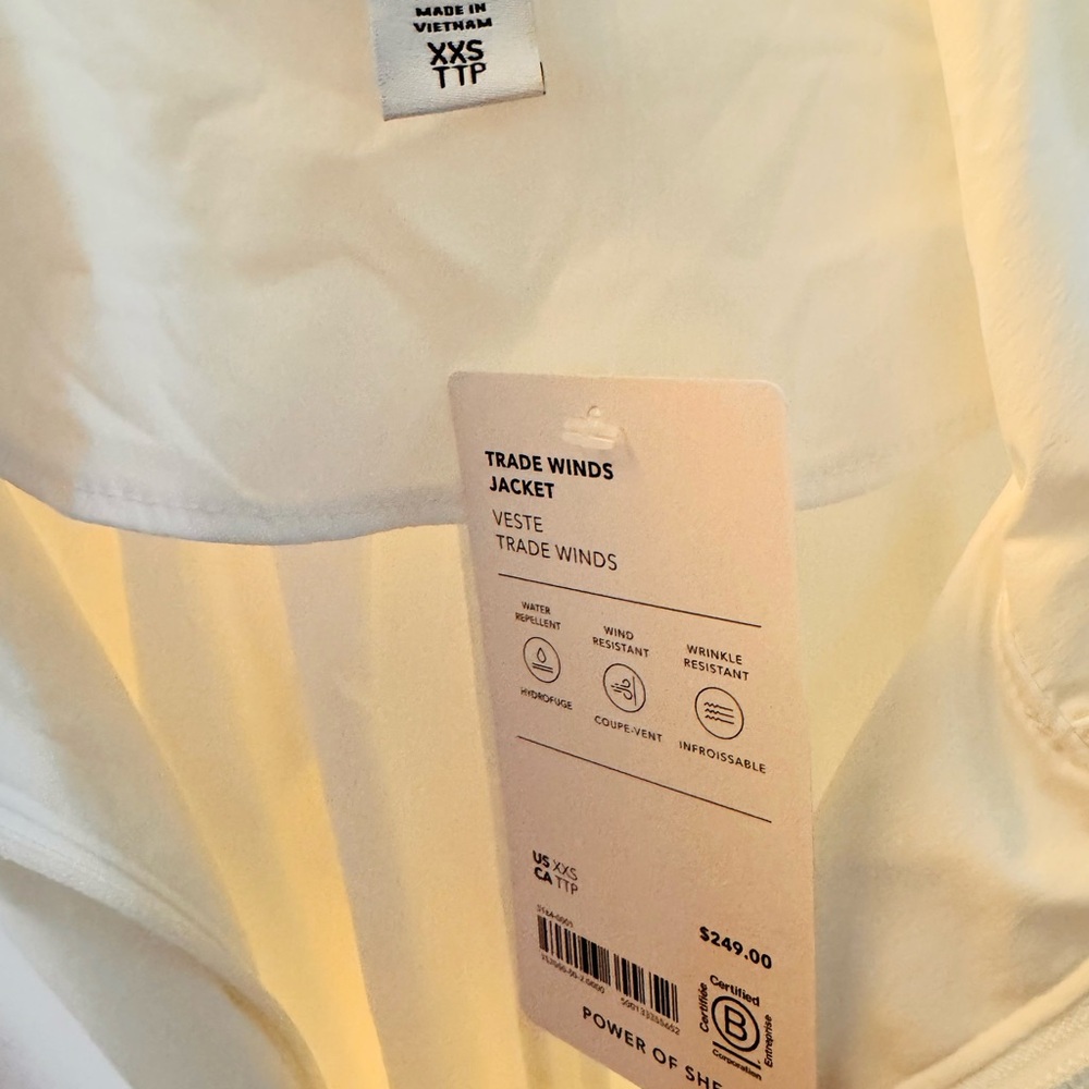 ATHLETA long, lightweight, white hooded windbreaker rain jacket. Elastic waist. - Picture 8 of 10